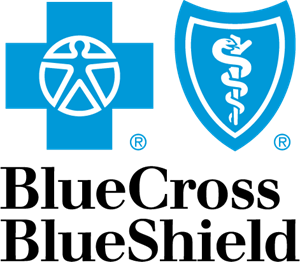 A blue cross and shield logo on a green background.