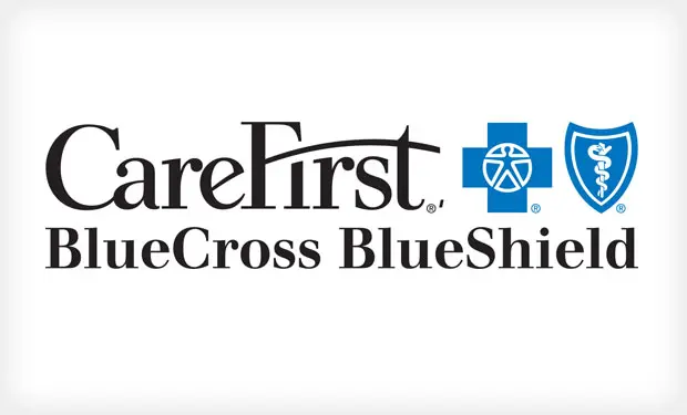 A blue cross logo with the word " carefirst bluecross blueshield ".